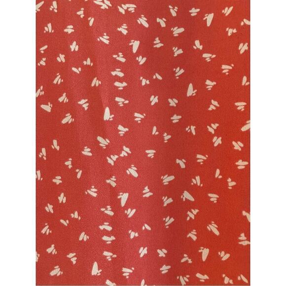 Blouse top coral contemporary print pleated cap sleeve rounded bottom V-neck L
C - Picture 7 of 7